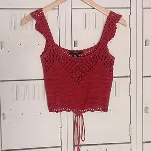 Reddish orange crocheted crop top
